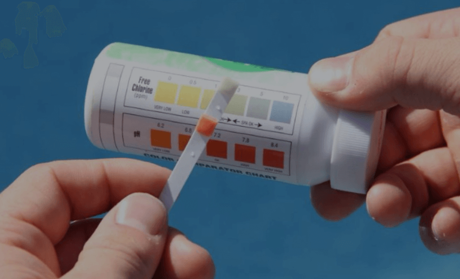 water chemistry test kit being used for pool”