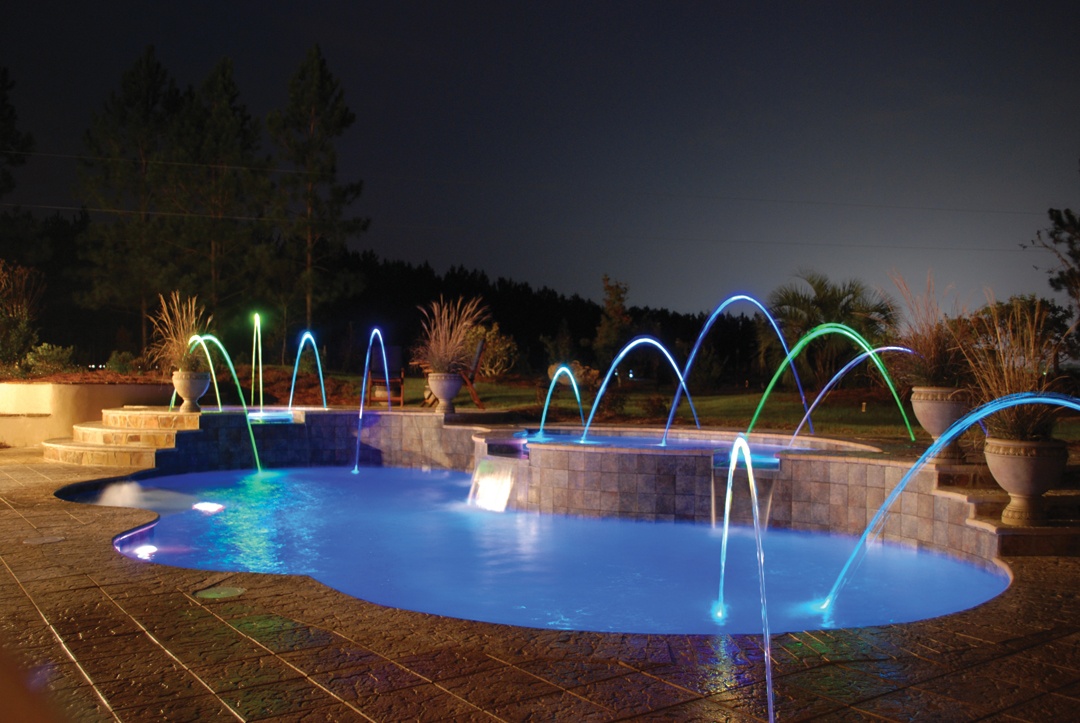 Deck Jets and custom lighting Trilogy fiberglass Pool