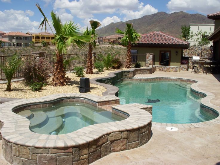 Stone Spa flowing into Backyard Pool