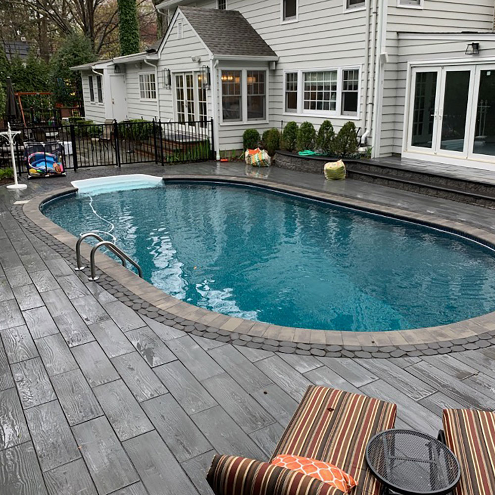 Oval vinyl liner pool with new hardwood decking