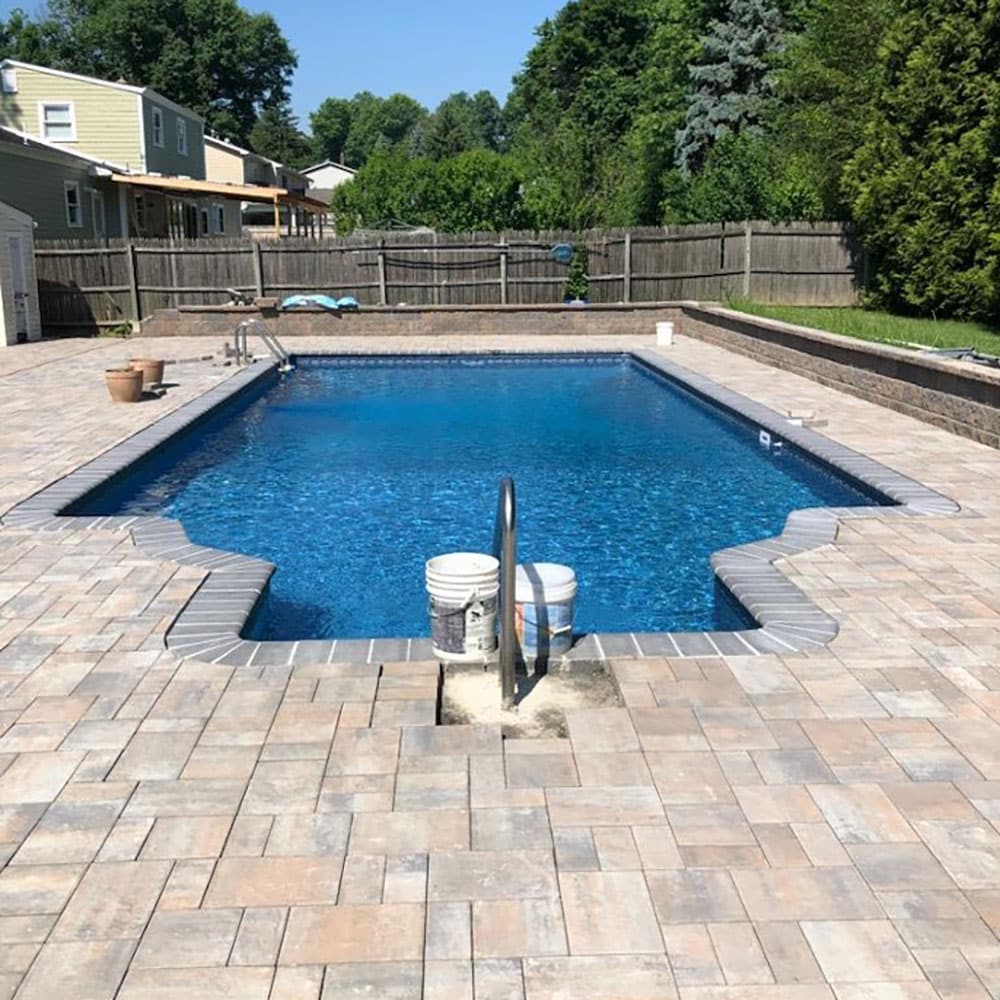 Rectangle vinyl liner pool with new tiled decking