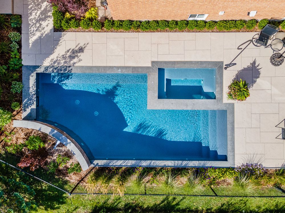 Aerial view of a custom rectangular vinyl liner pool
