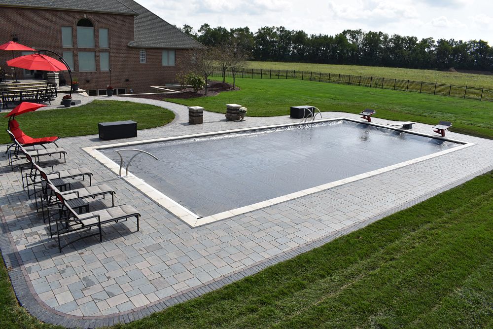 rectangular pool with contrasting deck colors