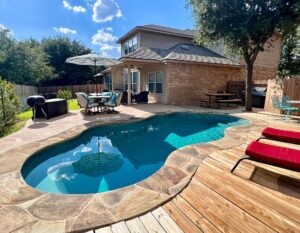 compact fiberglass pool in a small southern backyard