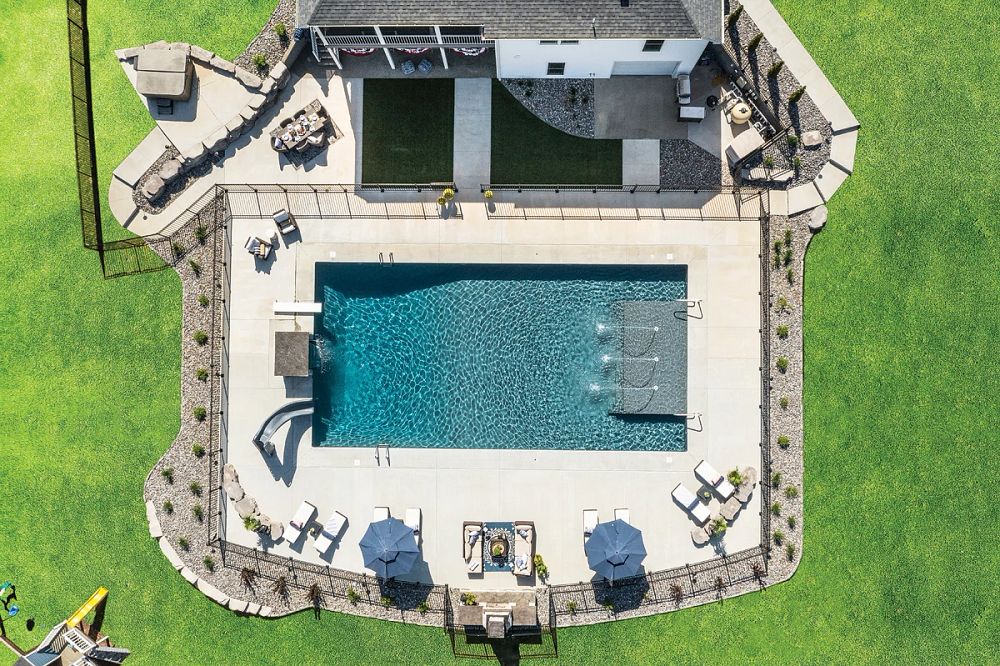 vinyl liner pool with custom water features in Missouri backyard