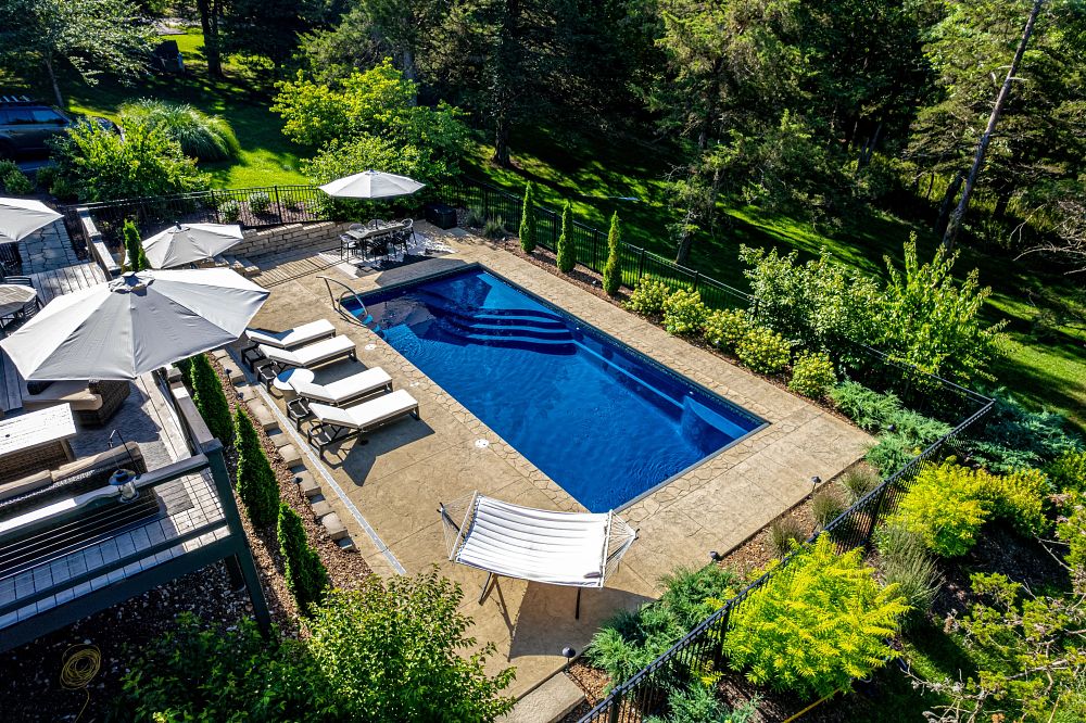 rectangular shaped fiberglass pool in Missouri backyard