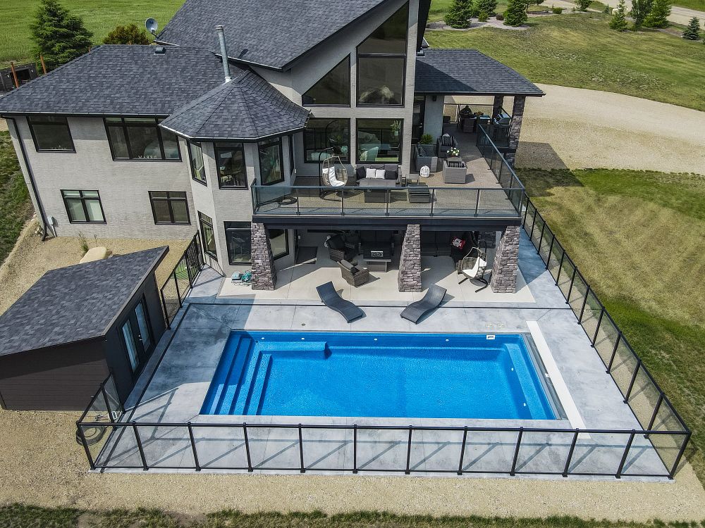 spacious pool in a large Canadian backyard
