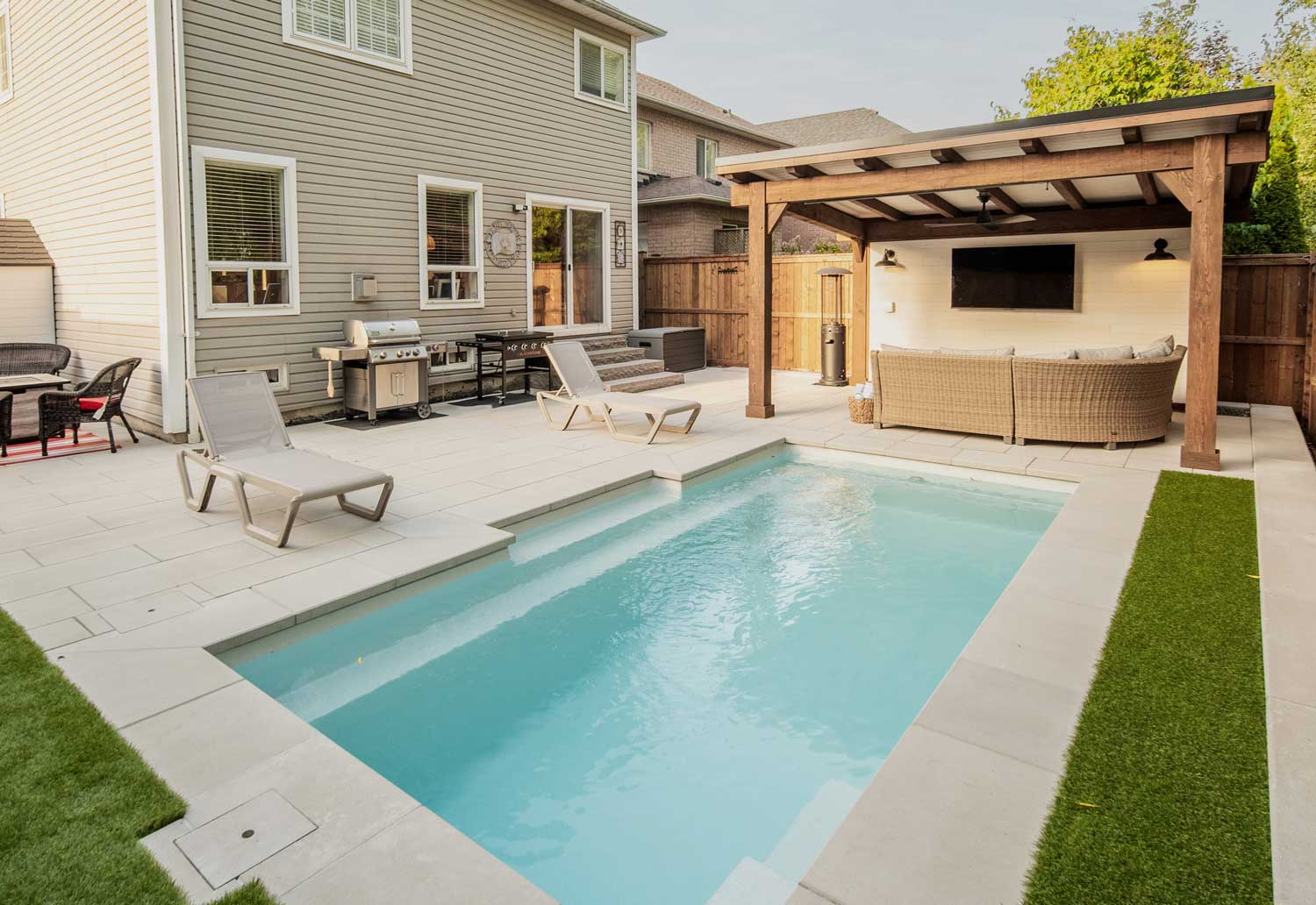 Tuscan 11.20 Fiberglass Pool | Photo courtesy of Scenic View Landscaping Inc., Canada